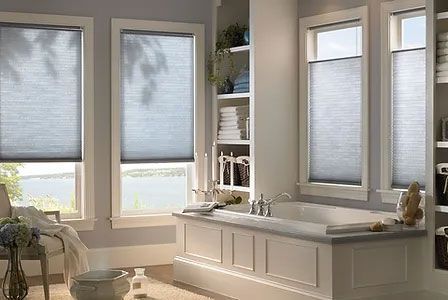 windows with closed blinds.