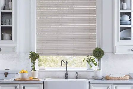 kitchen sink with window blinds