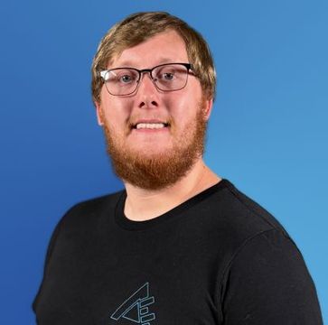a picture of Trent Heston in blue background