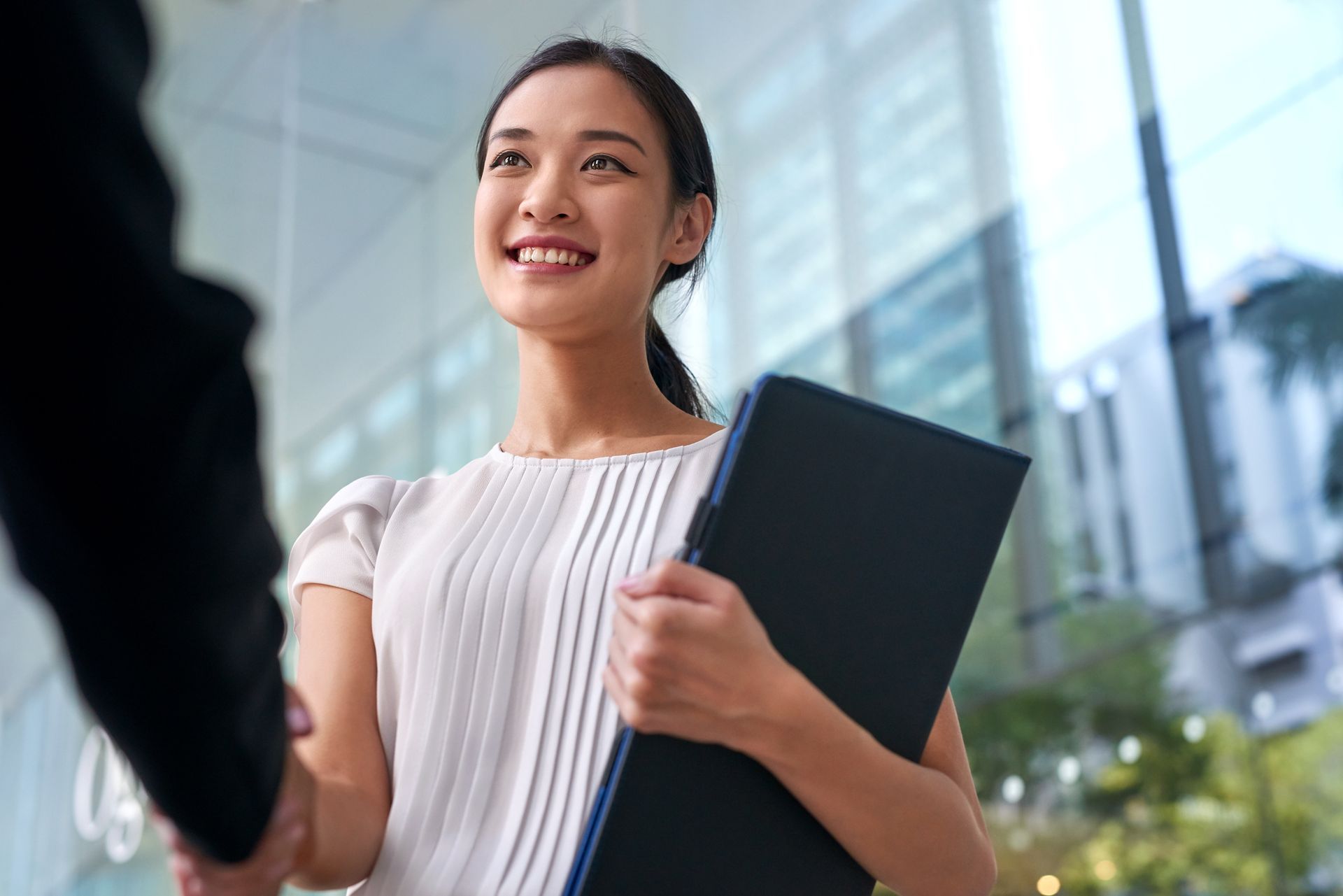 Woman shaking hands