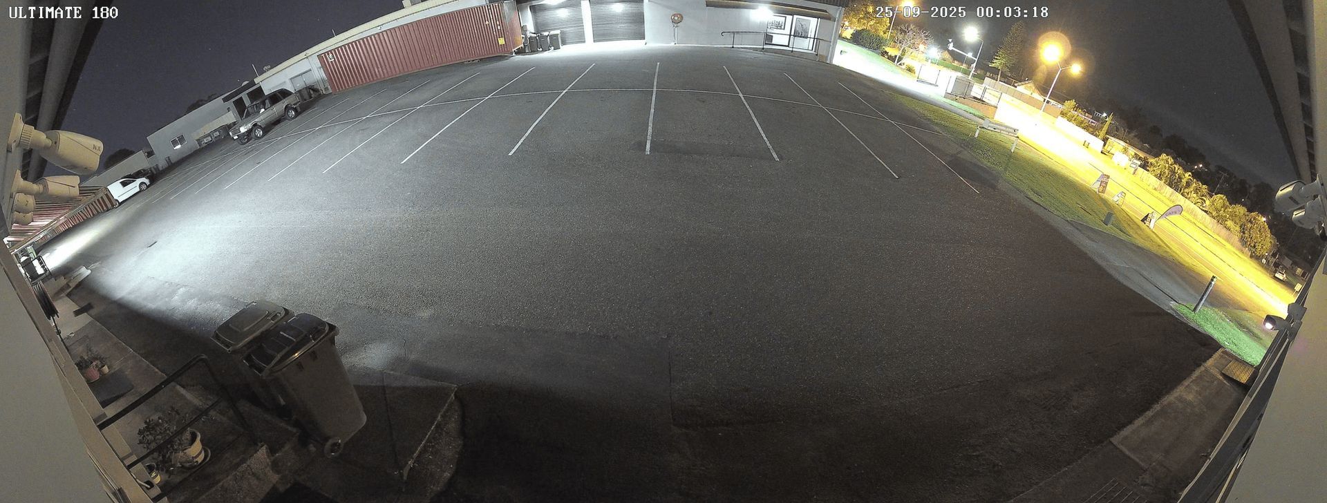 White Security Camera on a Wooden Surface — Austec IT & CCTV in Beerwah, QLD