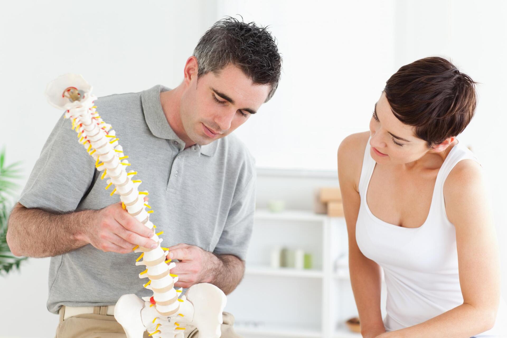 two people looking at the bone