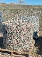 A pile of rocks sitting on top of a wooden pallet.