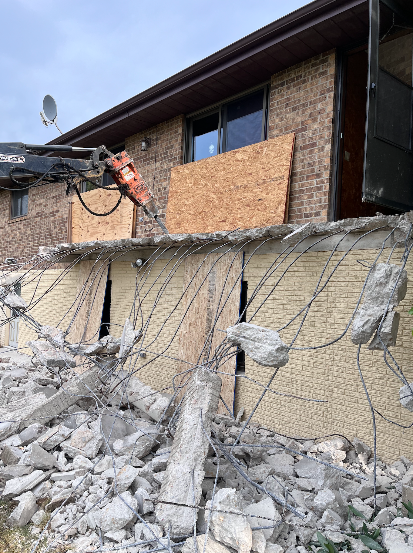 A partially completed home renovation project with unexpected material expenses and time-consuming repairs.