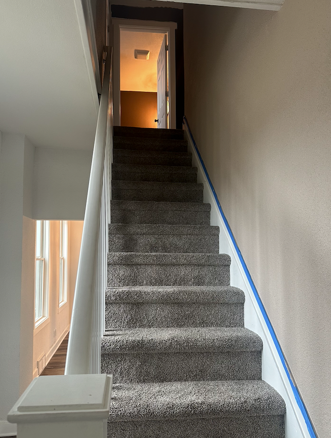 New steps and carpet after remodel.