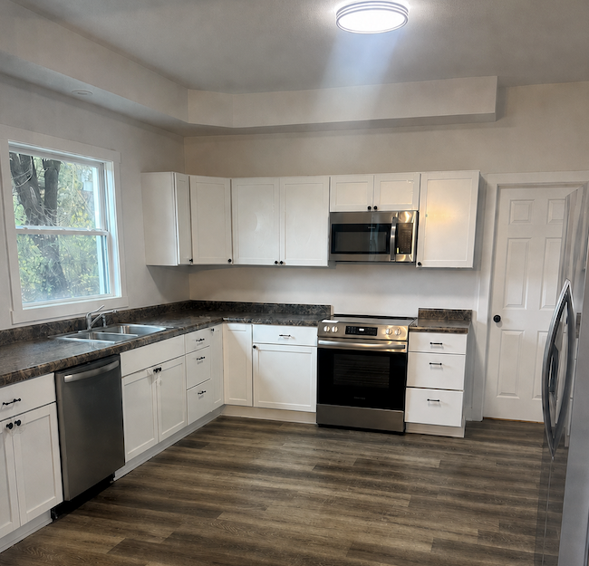 This is a kitchen after AMC Homes gets in.