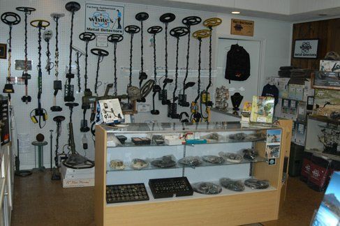 A store with a lot of metal detectors on the wall
