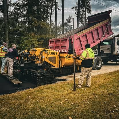 Man Working on Asphalt — Pikefield, NC — Asphalt Services of Goldsboro Man Working on Asphalt — Pikefield, NC — Asphalt Services of Goldsboro