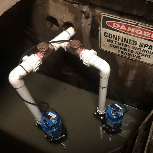 Stormwater pump pipework installed in a confined pump pit, Sydney