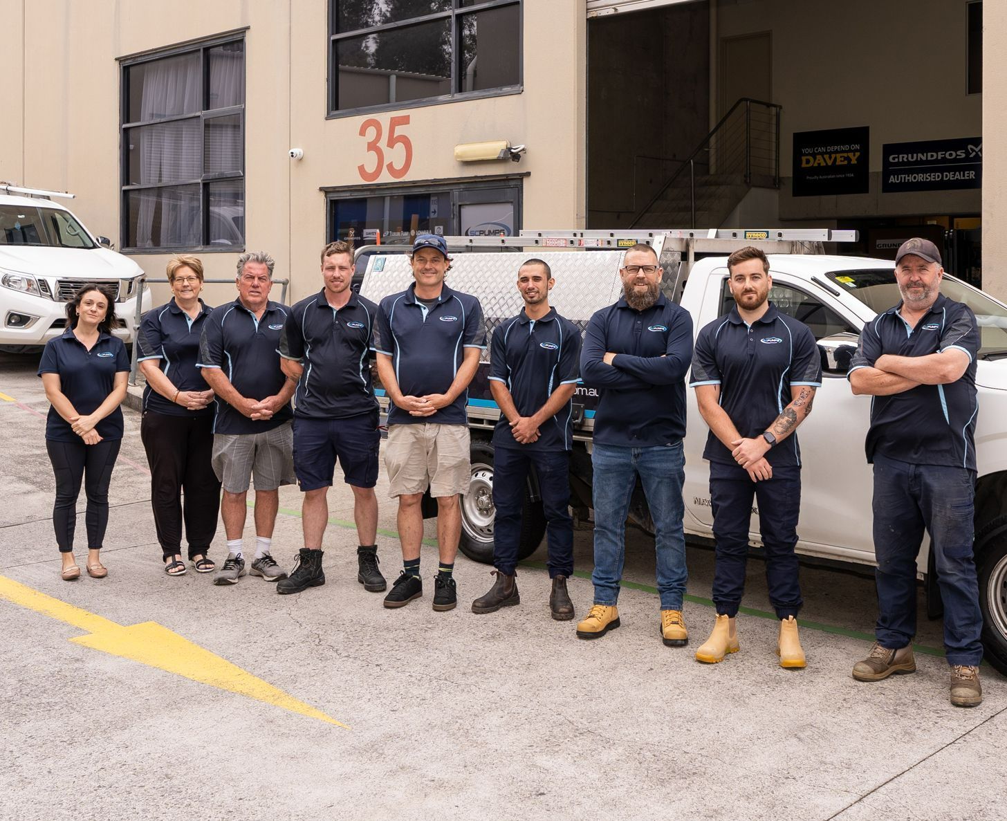 Sydney Central Pumps team standing in front of a service vehicle at Moorebank workshop