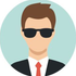 Avatar of a person in sunglasses, black suit, and red tie on a light blue background