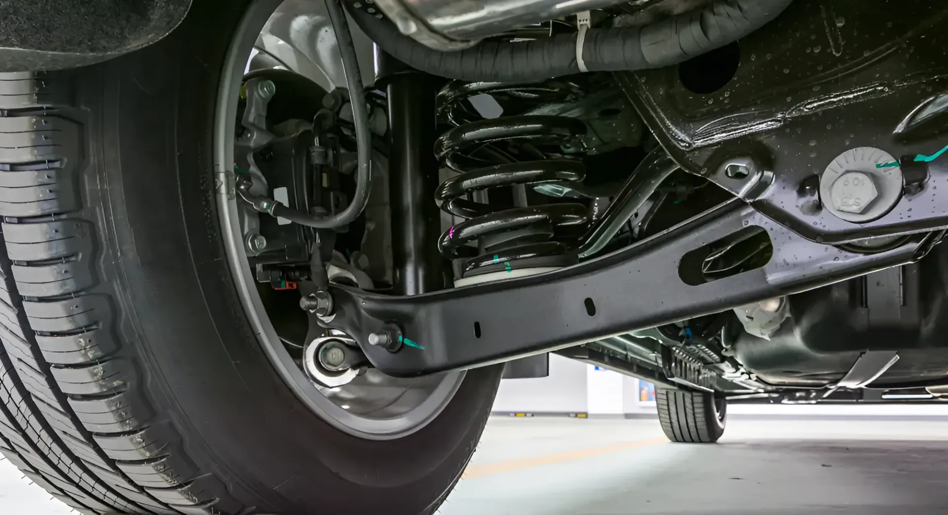 Underside of a Vehicle, Showing a Black Suspension System — Innisfail Pro Motors in Innisfail, QLD