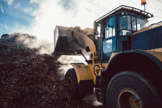 bulldozer in the compost
