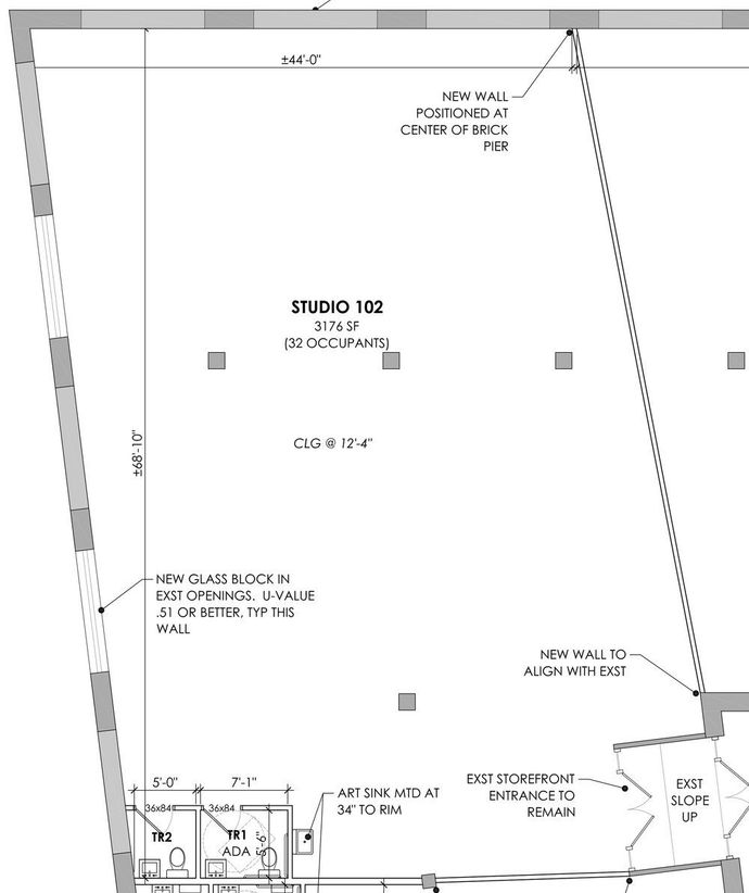 a black and white floor plan of a large building .