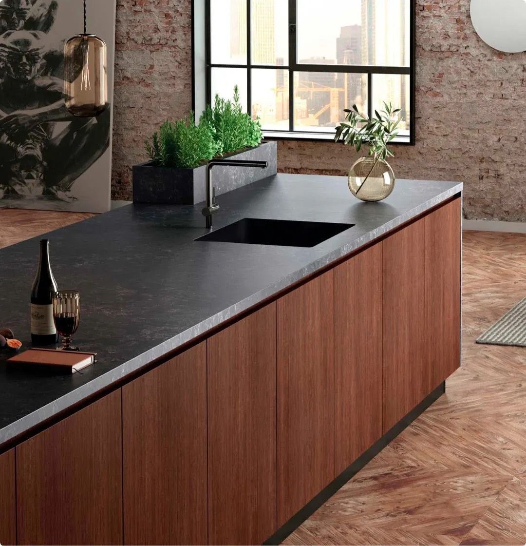 Dekton countertops in a sleek, industrial-style kitchen.