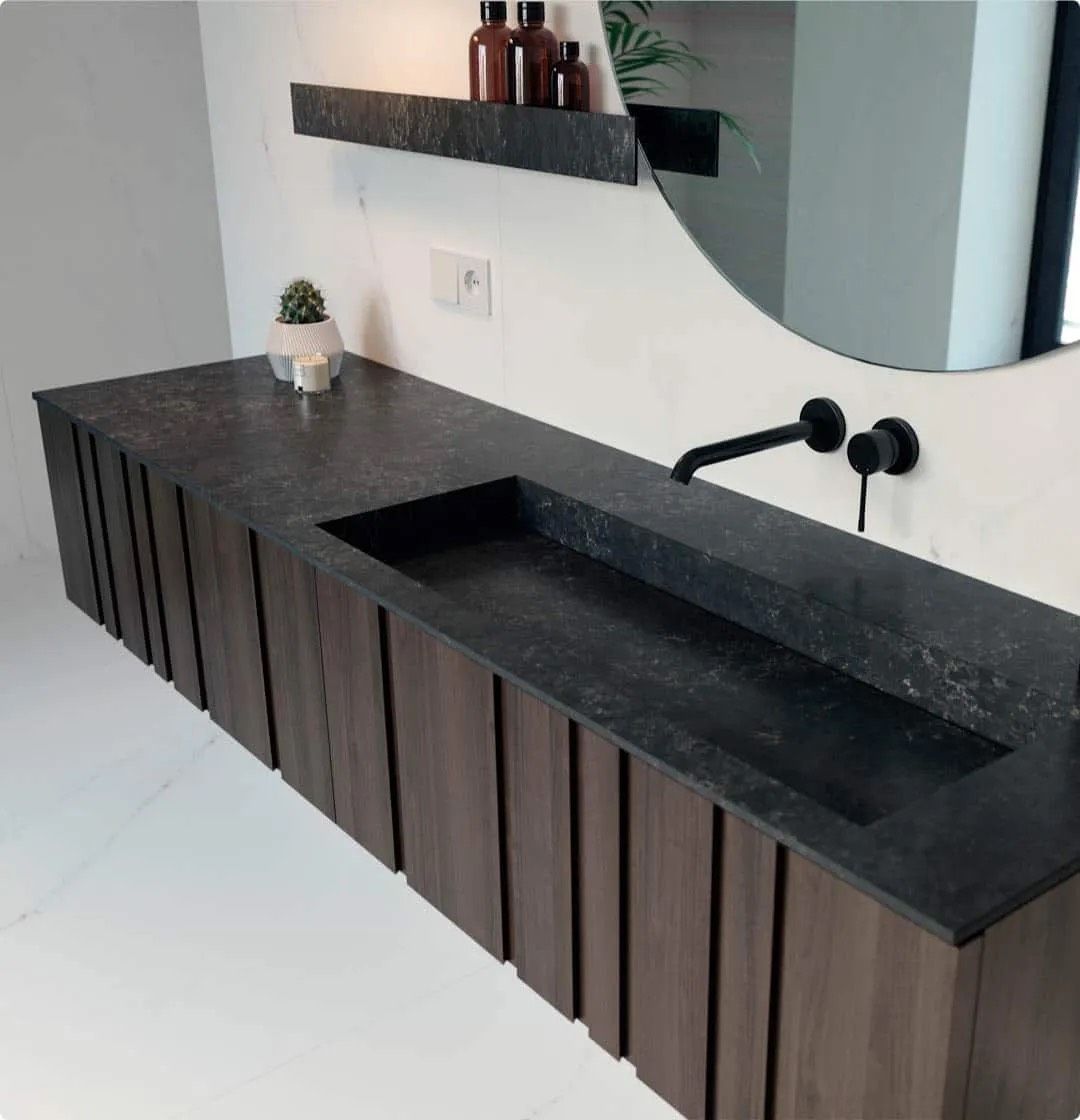 Dekton integrated sink in a modern bathroom design.