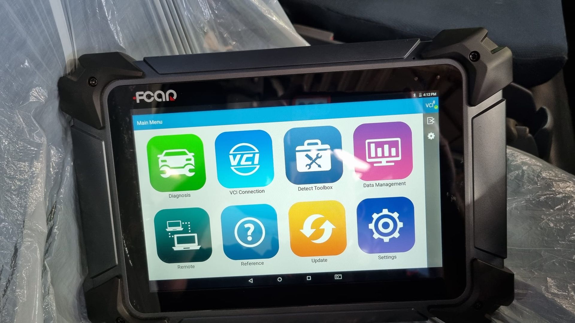 A Rugged Tablet Displays a Diagnostic Software Menu — B & W Commercials In Port Macquarie, NSW