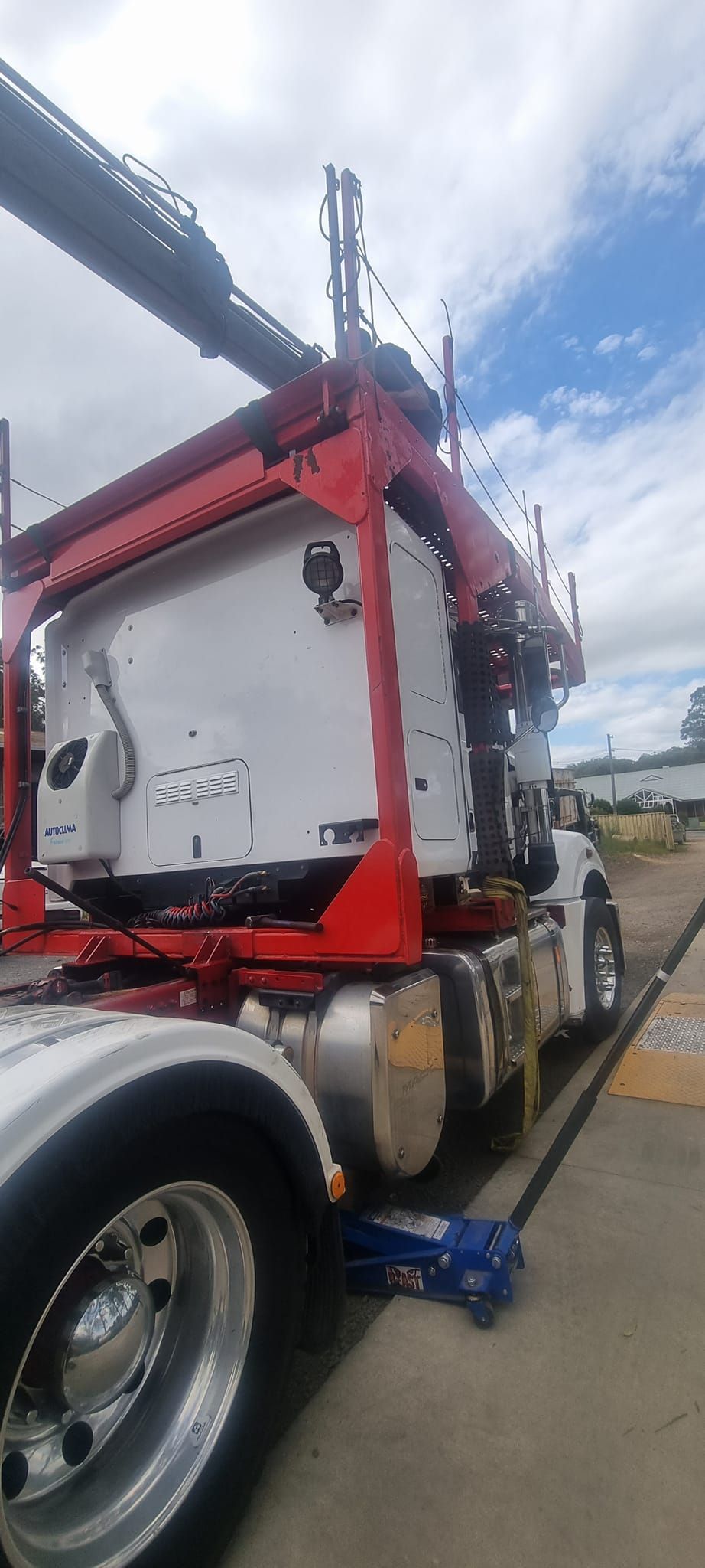 A Semi-truck With a White Cabin and a Prominent Red Crane — B & W Commercials In Wauchope, NSW
