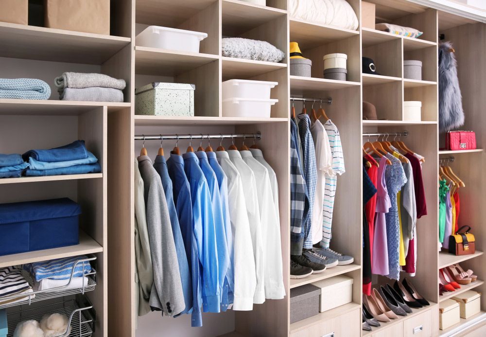 A Closet Filled with Lots of Clothes and Shoes — Rodney Lees Cabinetmaking In Byron Bay, NSW