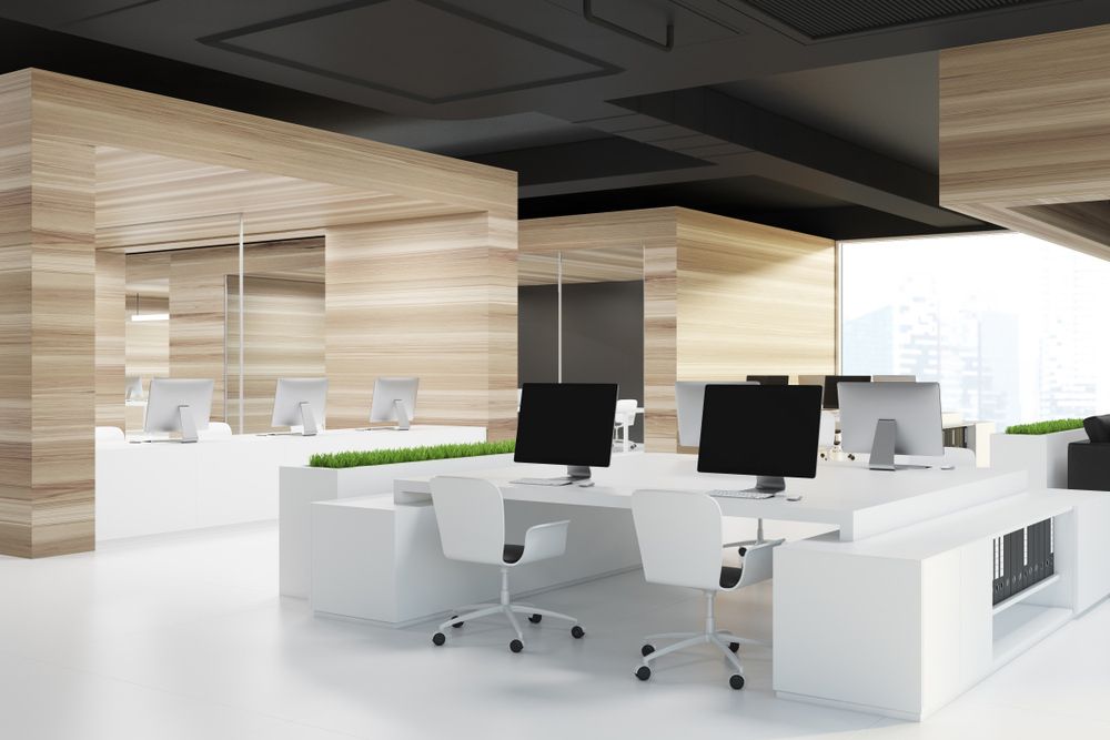 A Modern Office with Wooden Walls and White Desks and Chairs — Rodney Lees Cabinetmaking In Evans Head, NSW