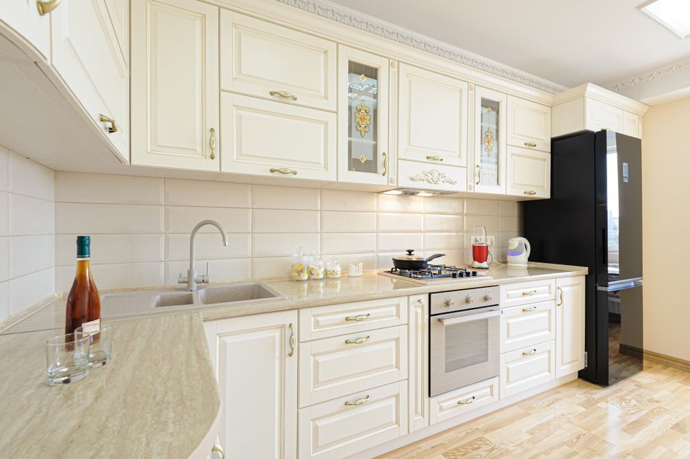 There Is a Bottle of Wine on The Counter in The Kitchen — Rodney Lees Cabinetmaking In Ballina, NSW