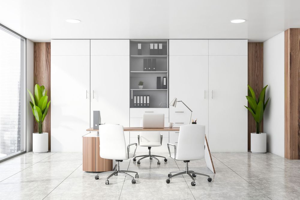 A Modern Office with A Desk, Chairs, Shelves and A Large Window — Rodney Lees Cabinetmaking In Casino, NSW