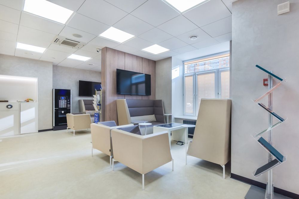A Waiting Room with Chairs, a Couch and A Television — Rodney Lees Cabinetmaking In Alstonville, NSW