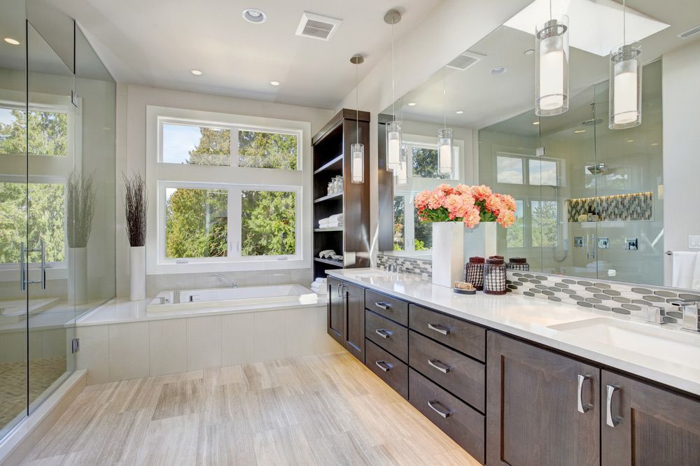 A Bathroom with Two Sinks, a Tub, and A Large Mirror — Rodney Lees Cabinetmaking In Mullumbimby, NSW