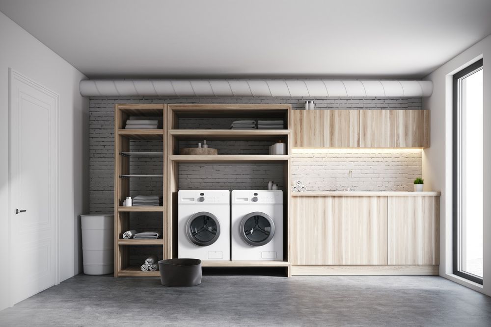 A Laundry Room with Two Washing Machines and A Sink — Rodney Lees Cabinetmaking In Alstonville, NSW
