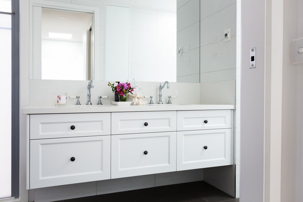 A Bathroom with Two Sinks and A Mirror — Rodney Lees Cabinetmaking In Casino, NSW