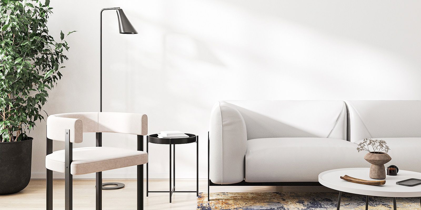 Interior with white sofa, chair, and potted plant. A side table and floor lamp are also present.