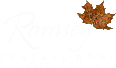 Ramsey Funeral Home logo with a fall leaf.