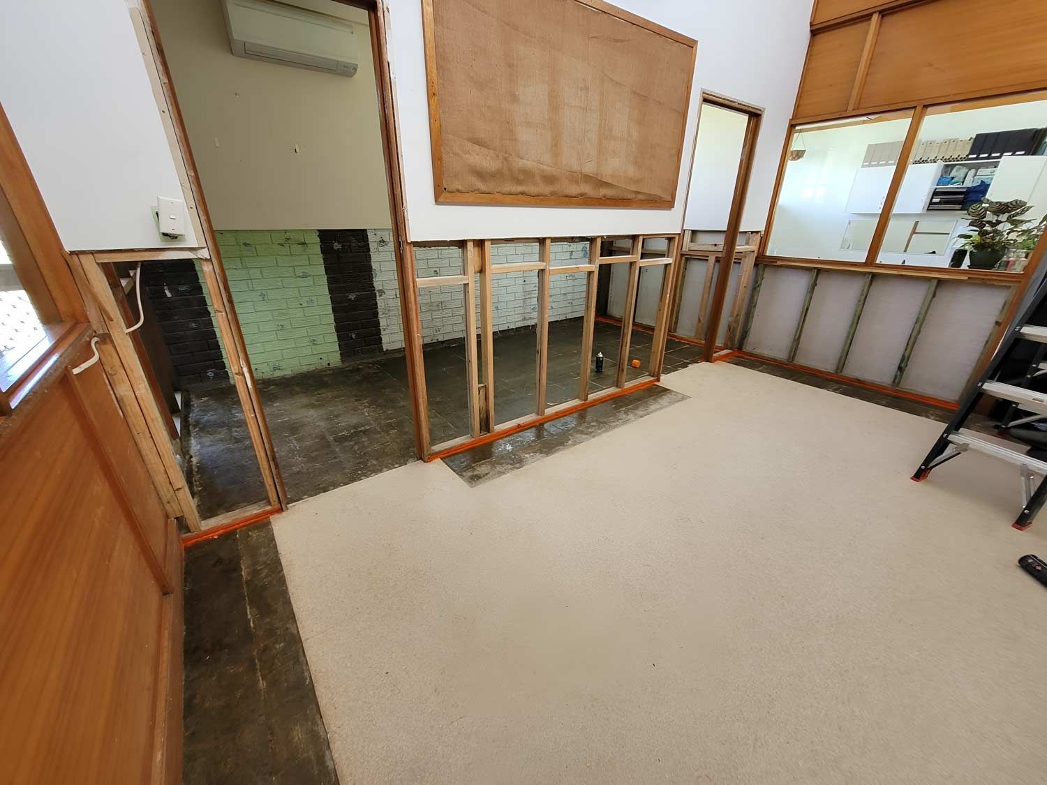 A Wooden Framed Room Prepared For Asbestos Removal — Accredited Asbestos Removers in Ballina, NSW