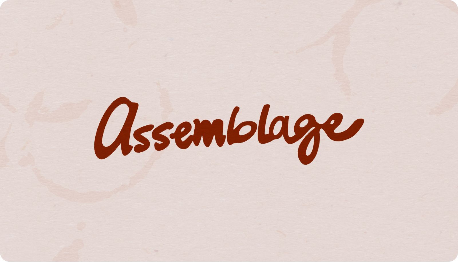 Brown handwritten word “Assemblage” on a light textured background
