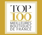 Logo or et blanc : « TOP 100 MEILLEURES BOUTIQUES DE FRANCE ».