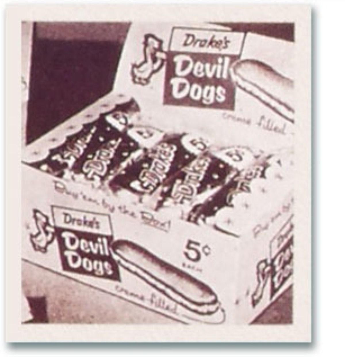 A vintage display box of Drake’s Devil Dogs snack cakes priced at 5 cents each.