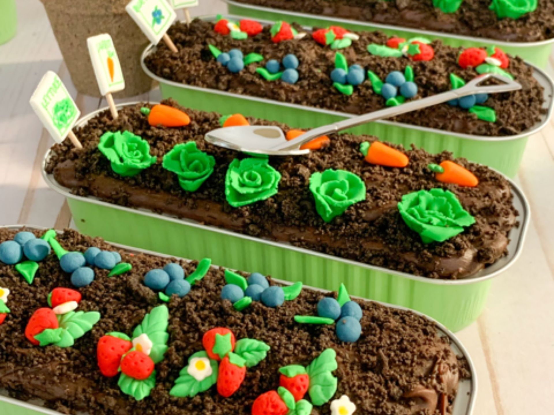 Three rectangular baking tins filled with chocolate 