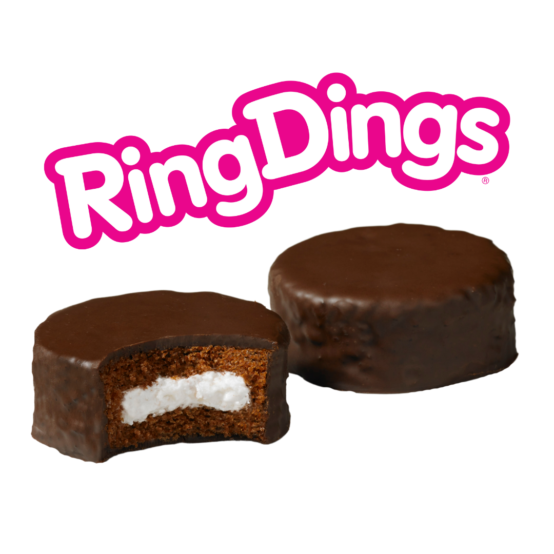 The Ring Dings logo appears above two round, chocolate-covered snack cakes, one of which has a bite taken out of it.
