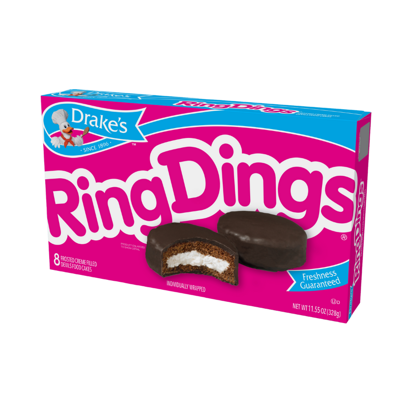 A box of Drake's Ring Dings featuring a pink background, brand logo, and chocolate-covered cakes with white cream filling.