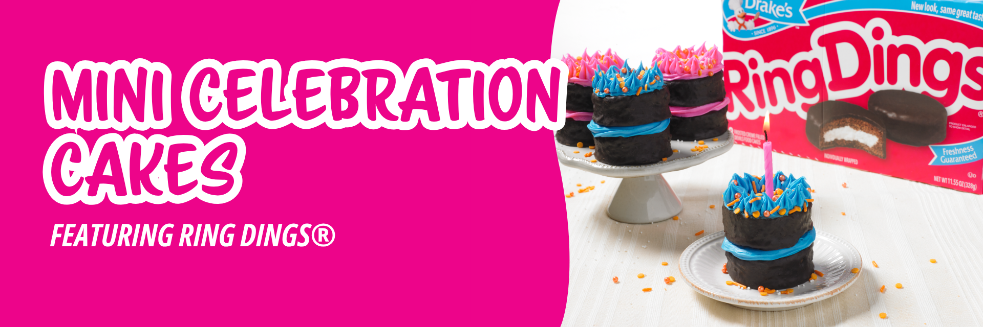 Pink banner promoting three mini chocolate cakes decorated with pink or blue icing sit on white plates, with a Ring Ding box in the background.