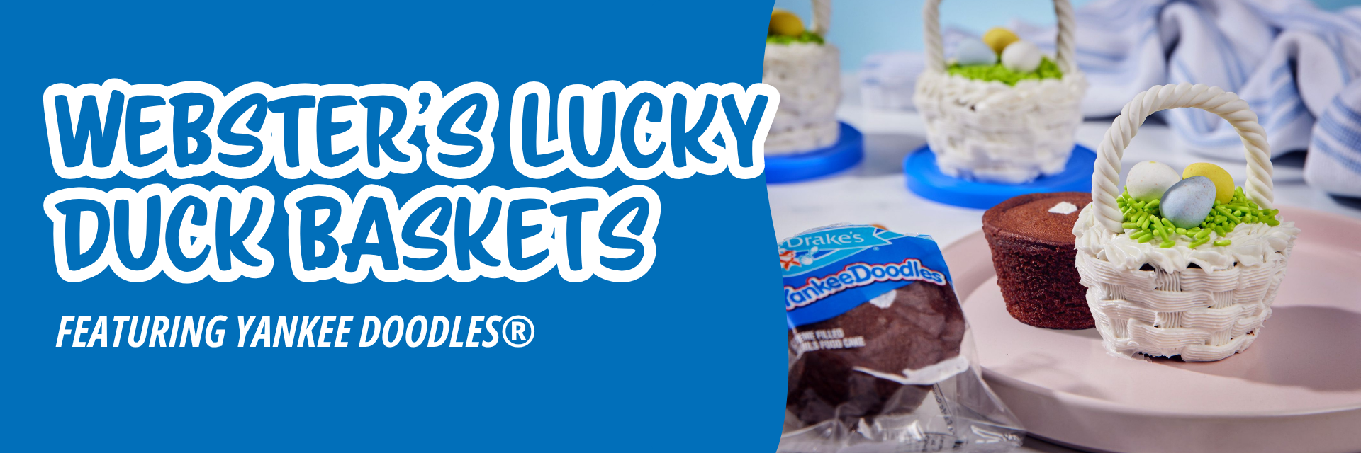 Blue banner promoting cupcakes decorated as Easter baskets with white frosting and candy eggs, next to a package of Drake’s Yankee Doodles cakes.