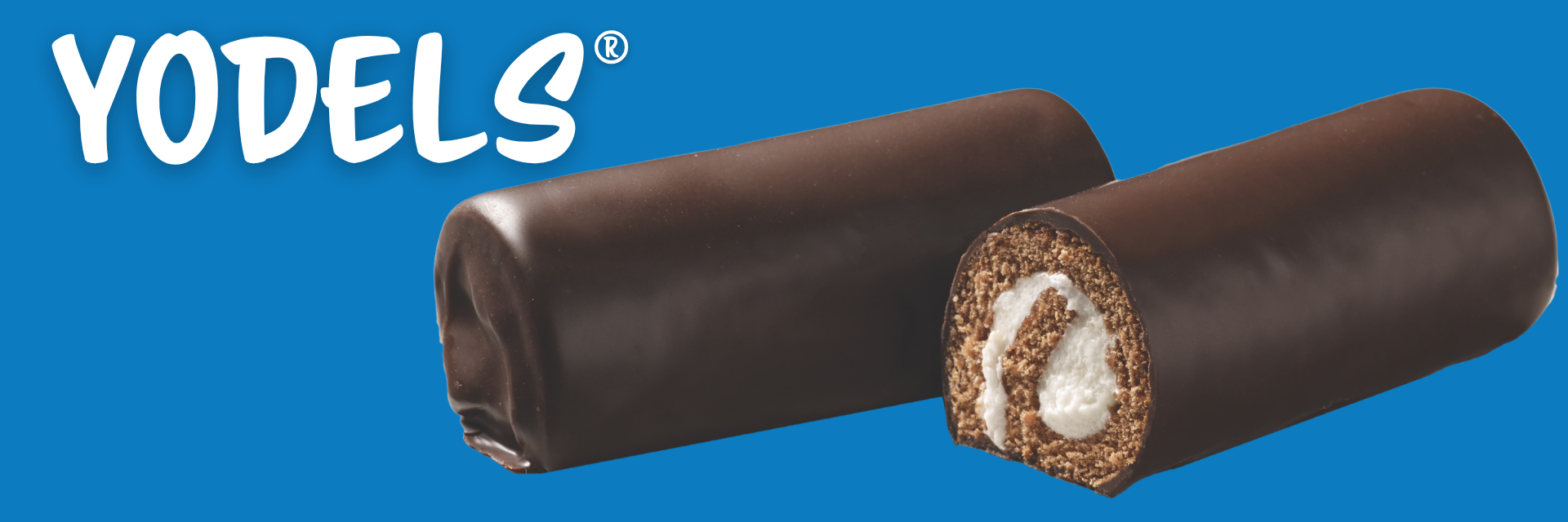 Two Drake's Yodels chocolate-covered sponge cakes with cream filling against a solid blue background.