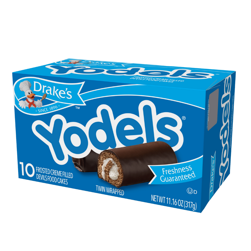 A blue box of Drake's Yodels, featuring a chocolate cake roll with creme filling and a logo with a chef character.