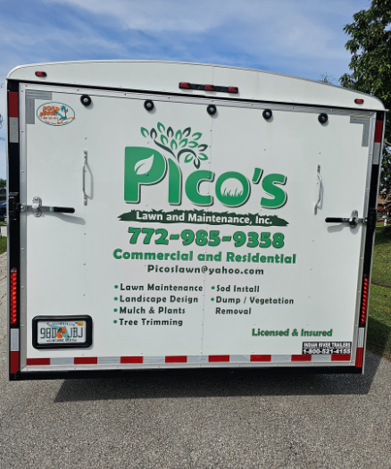 Pico 's lawn and maintenance trailer is parked on the side of the road