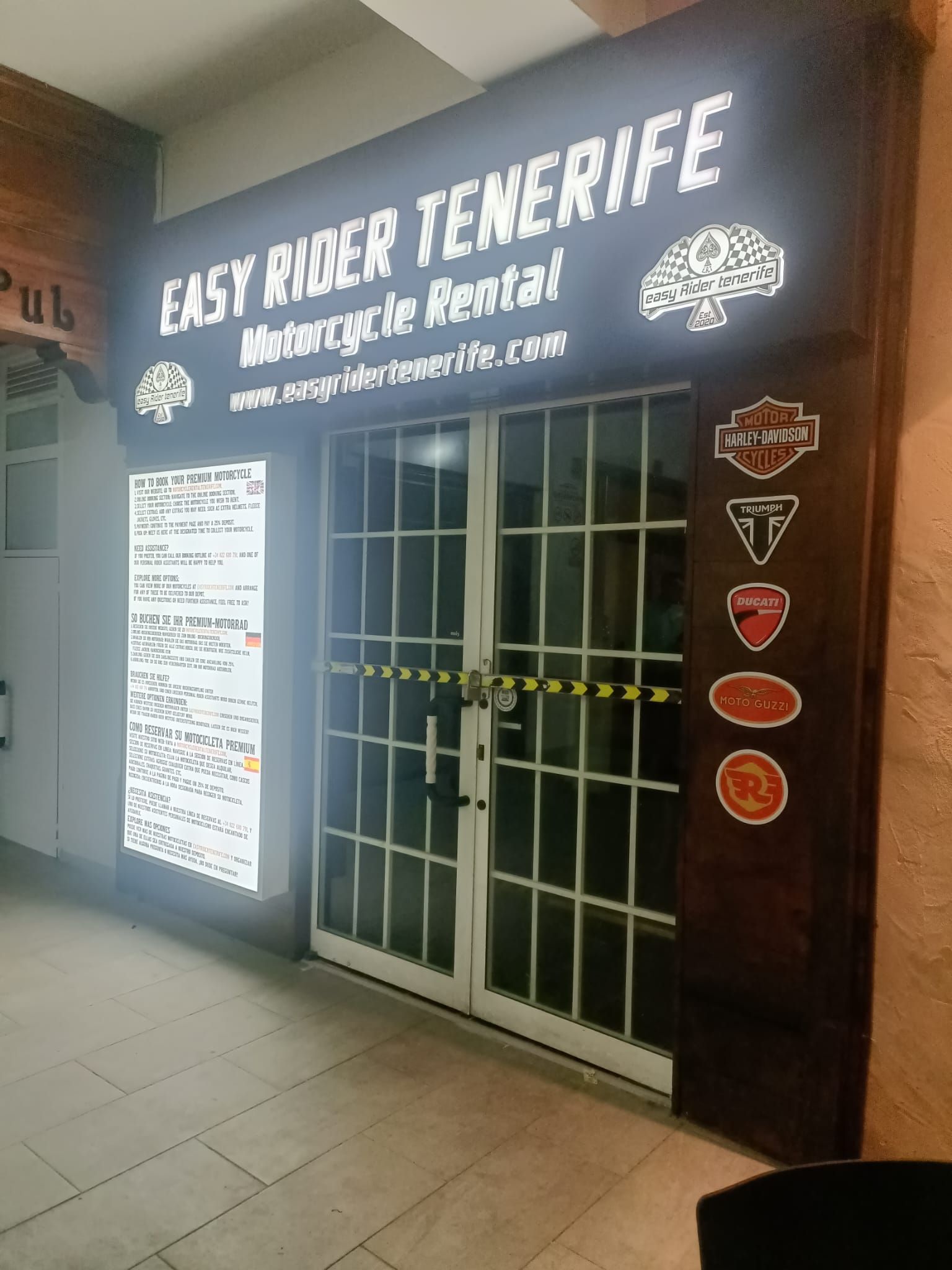 A store front with a sign that says easy rider tenerife