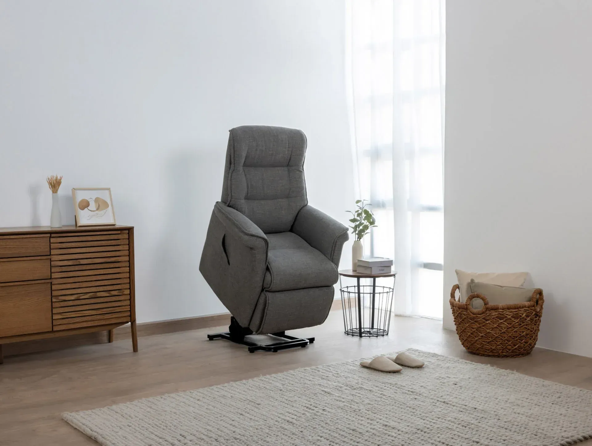 A Grey Recliner Is Sitting In A Living Room Next To A Window โ Envisage Furniture in Kialla, VIC