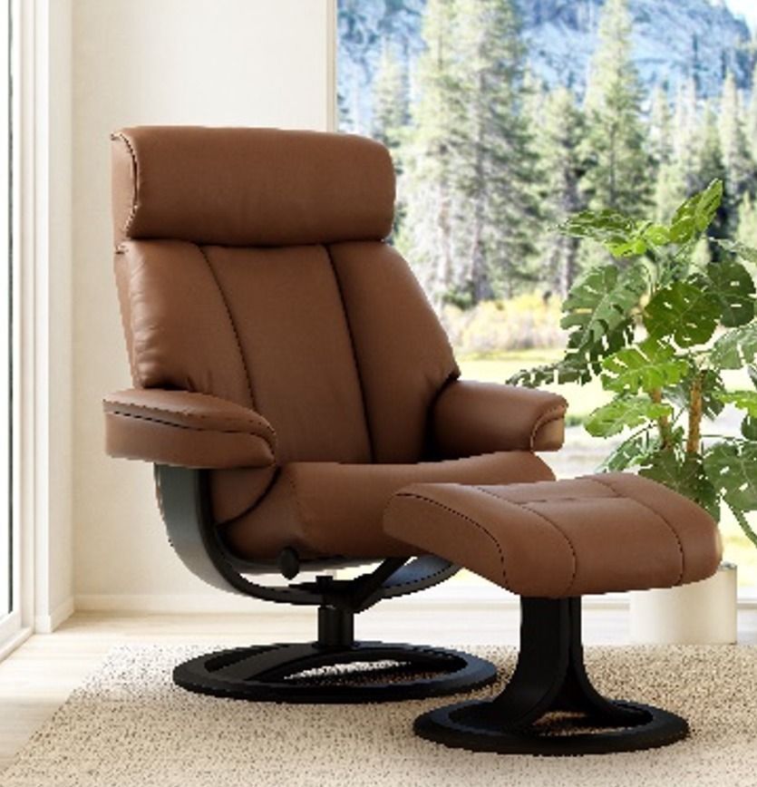 A Blue Leather Chair is Sitting in a Living Room Next to a Lamp — Envisage Furniture in Kialla, VIC