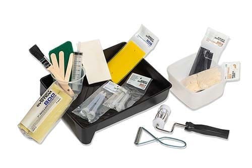A Tray Filled With Brushes , Sponges , and Other Tools — Envisage Furniture in Kialla, VIC