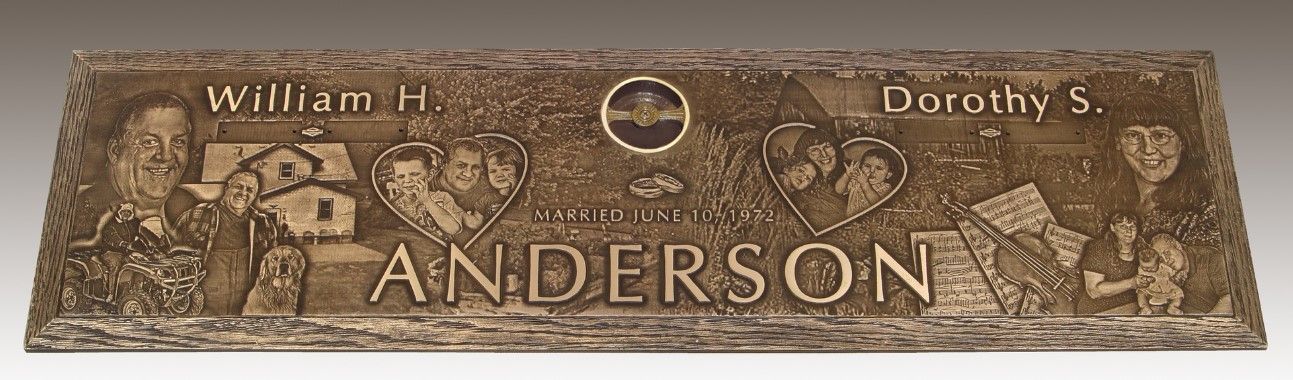 Bronze memorial plaque for the Anderson family, featuring carved portraits, heart motifs, and a house illustration.