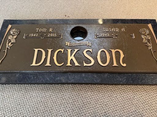 A bronze memorial plaque for